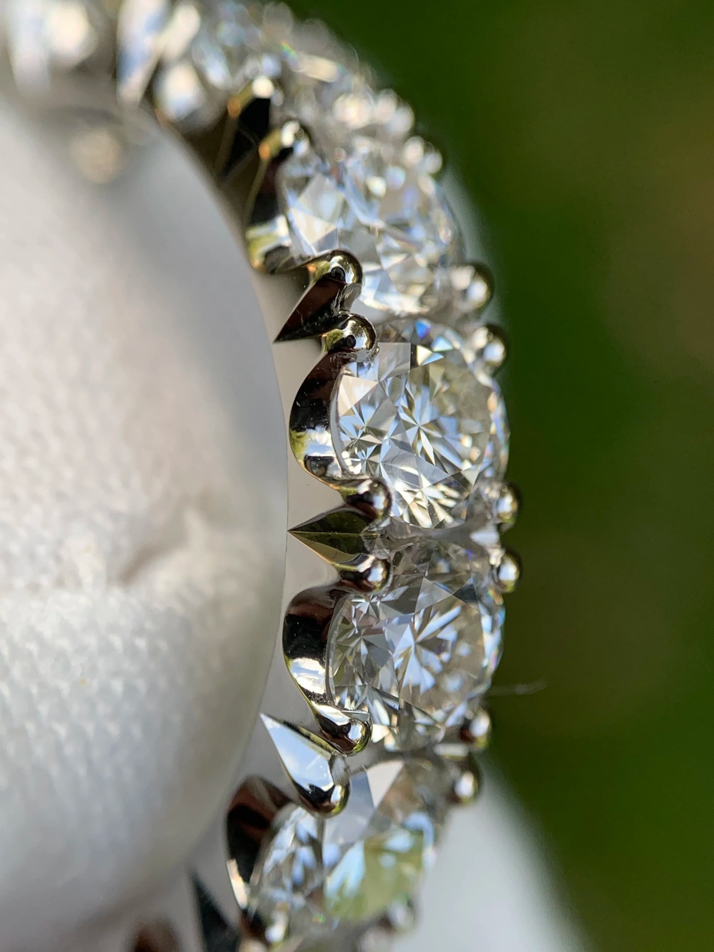 Workshop detail showing precision jewellery setting.