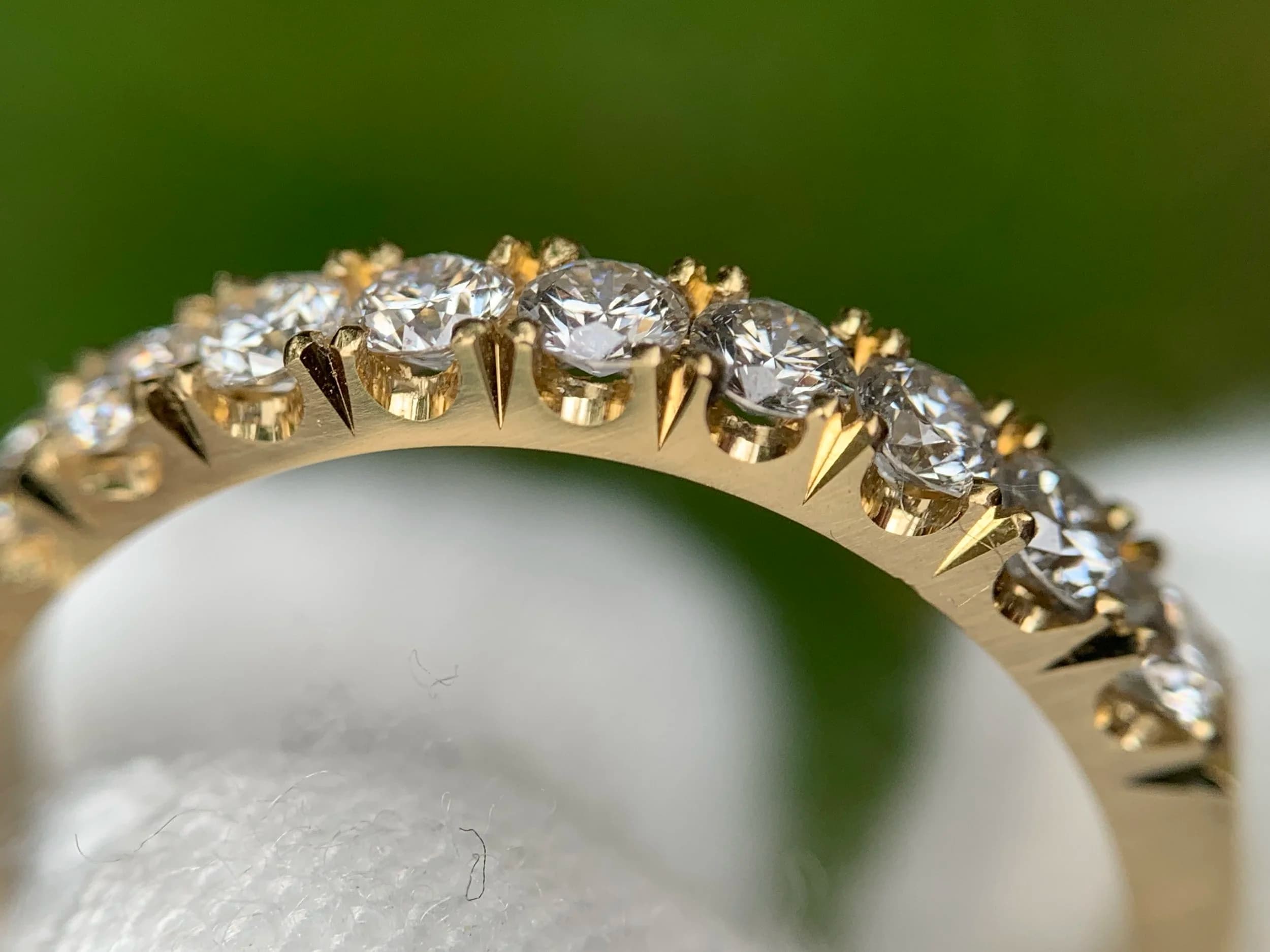 Macro photograph of diamond setting detail.